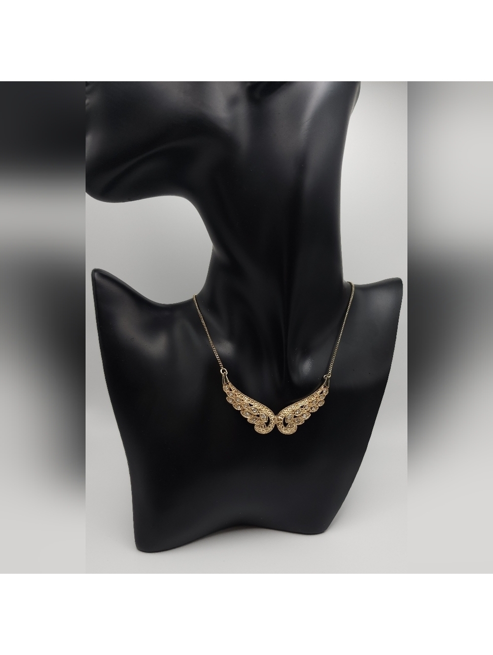Golden Angle Wings Necklace with Pave Crystal Accents